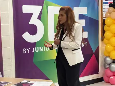 Image of a woman speaking to a group